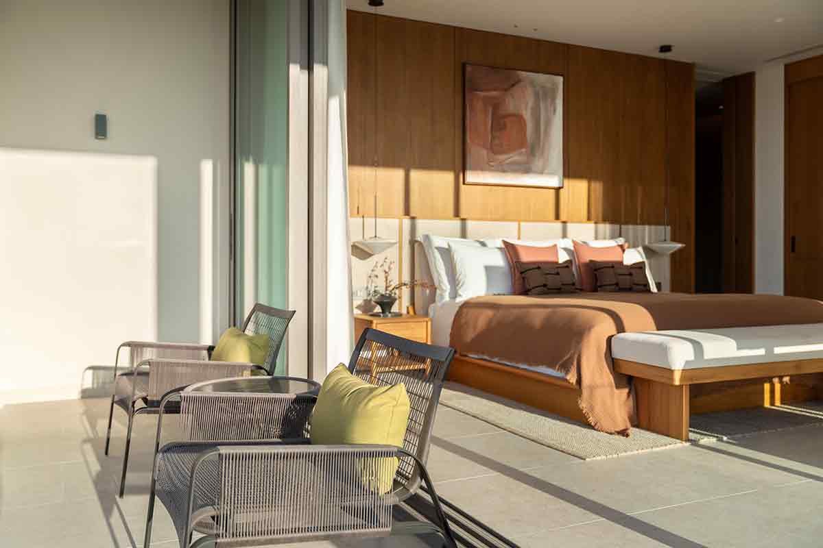 Kiara Reserve Residences — villa bedroom with terrace seating