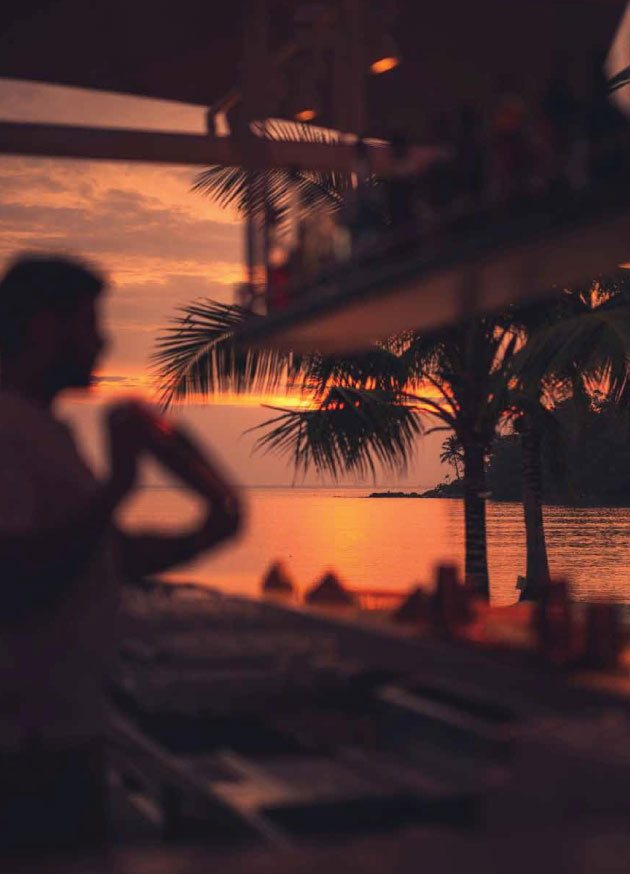 Sunset over the tropical coast of Layan Bay